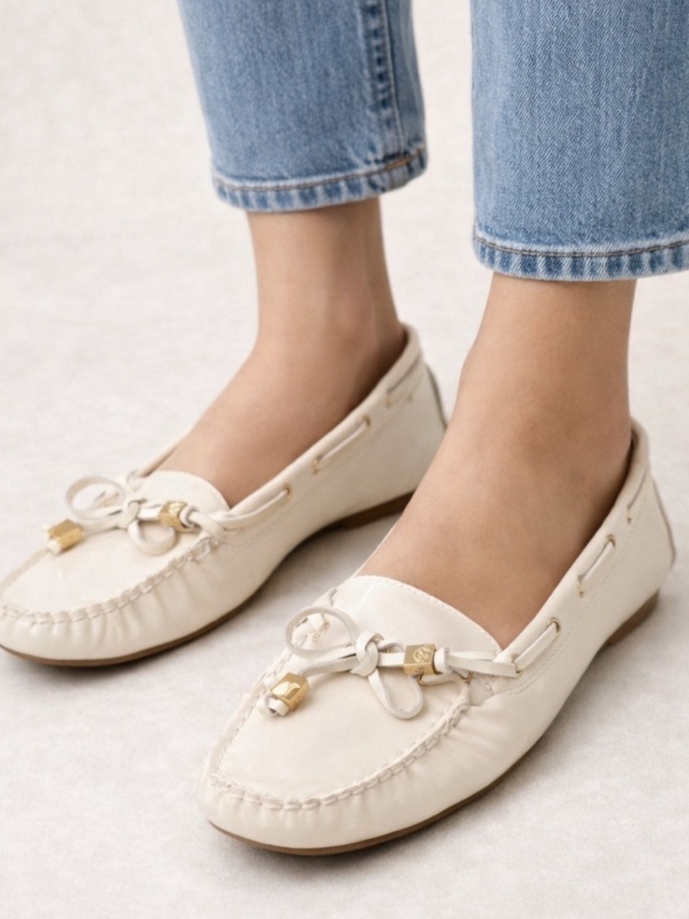 Michael Kors Beige Leather Bow Moccasin Loafers with Gold-Tone Accents
